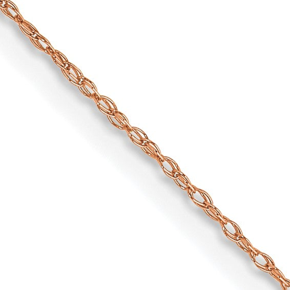 Rose gold chain on a light gray background