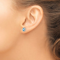 Sterling Silver Rhodium-plated Light Swiss Blue Topaz & Diam. Earrings