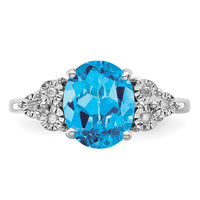 Sterling Silver Rhodium Diam. & Blue Topaz Ring