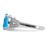 Sterling Silver Rhodium Diam. & Oval Blue Topaz Ring
