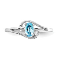 14k White Gold 5x3mm Oval Blue Topaz A Diamond ring