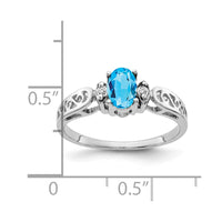14k White Gold 6x4mm Oval Blue Topaz VS Diamond ring