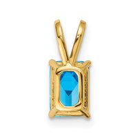 14k 7x5mm Emerald Cut Blue Topaz pendant