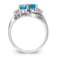 14k White Gold 6x4mm Oval Blue Topaz A Diamond ring